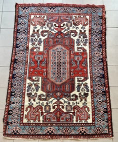HAND-KNOTTED PERSIAN RUG