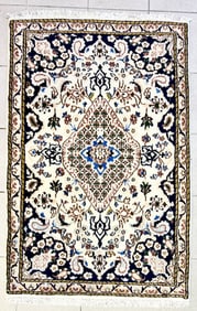 KIRMAN AREA RUG