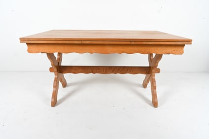MANNER OF H. KJAERNULF OAK X-BASE DINING TABLE