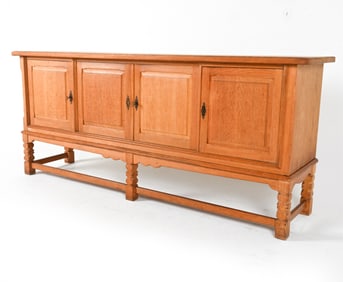 MANNER OF HENRY KJAERNULF OAK SIDEBOARD