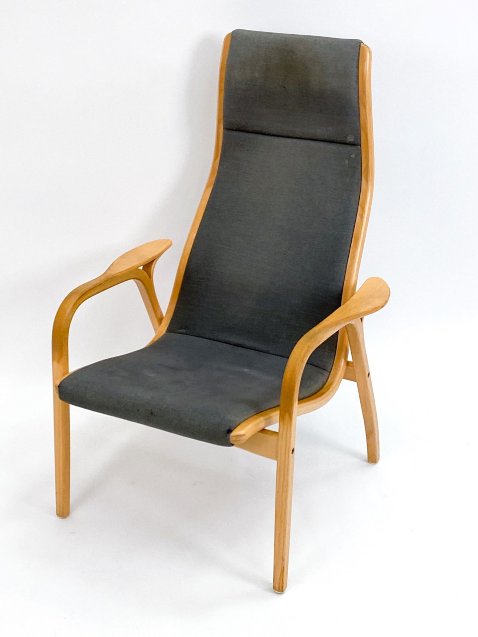 YNGVE EKSTROM 'LAMINO' CHAIR FOR SWEDESE: 'Lamino' lounge chair by Yngve Ekstrom (Swedish,1913-1988) for Swedese. Beech wood, upholstery. Label under. Made in Sweden. Originally designed circa 1960. Dimensions: H 40.75" x W 27.5" x D 29.5" x