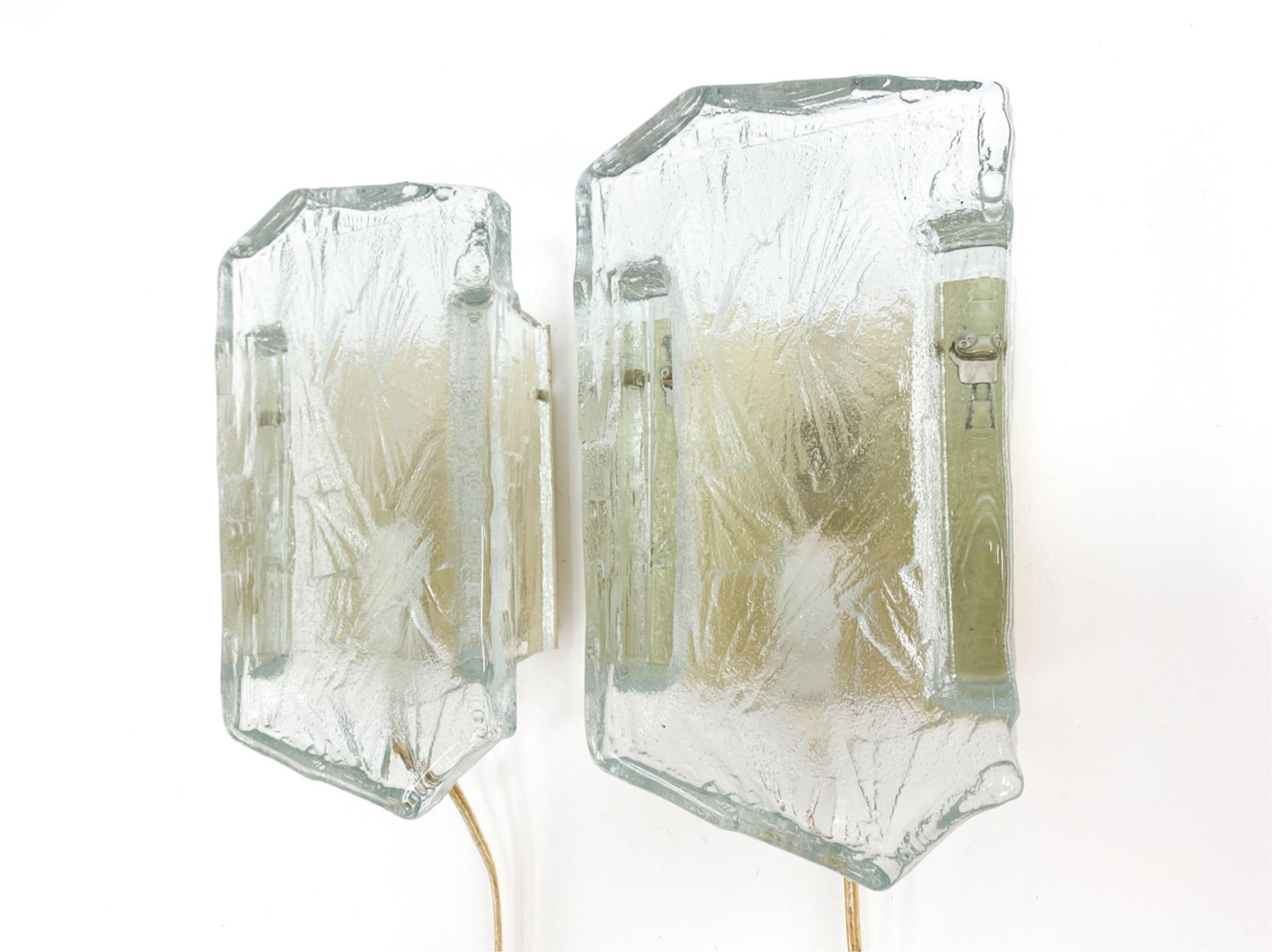 PAIR OF VITRIKA & ORREFORS GLASS WALL SCONCES: Circa 1950's. Signed Vitrika on mount of both. Dimensions: H 10" x W 6" x D 3.25" Condition: No issues to glass. Metal with some wear. Untested, may need rewiring. E128