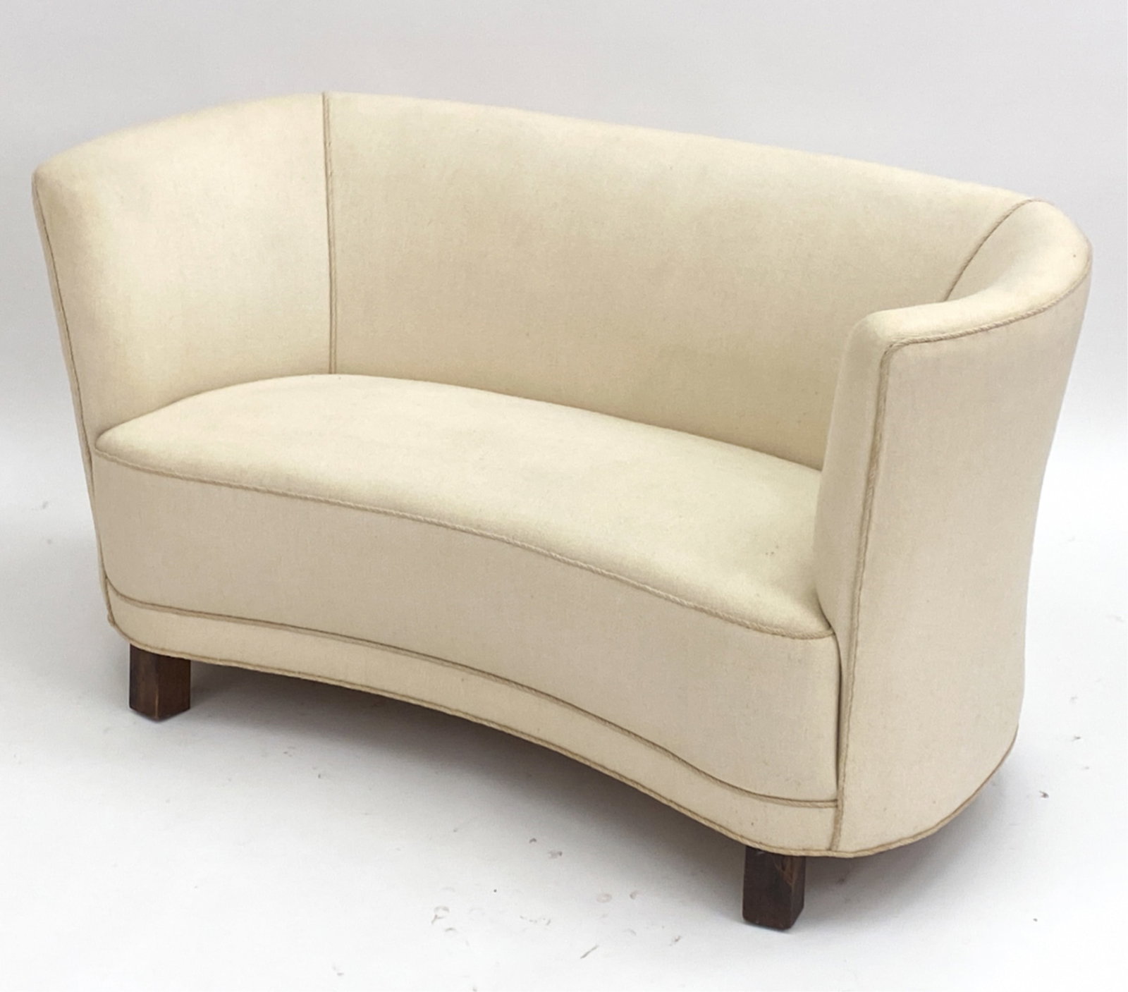 DANISH MID-CENTURY BEECHWOOD BANANA SOFA: Circa 1950's. Unsigned. Dimensions: H 28" x W 52" x D 27" x SH 16" Condition: Fabric clean for it's age. small spots of soiling. Finish wear to legs. E039