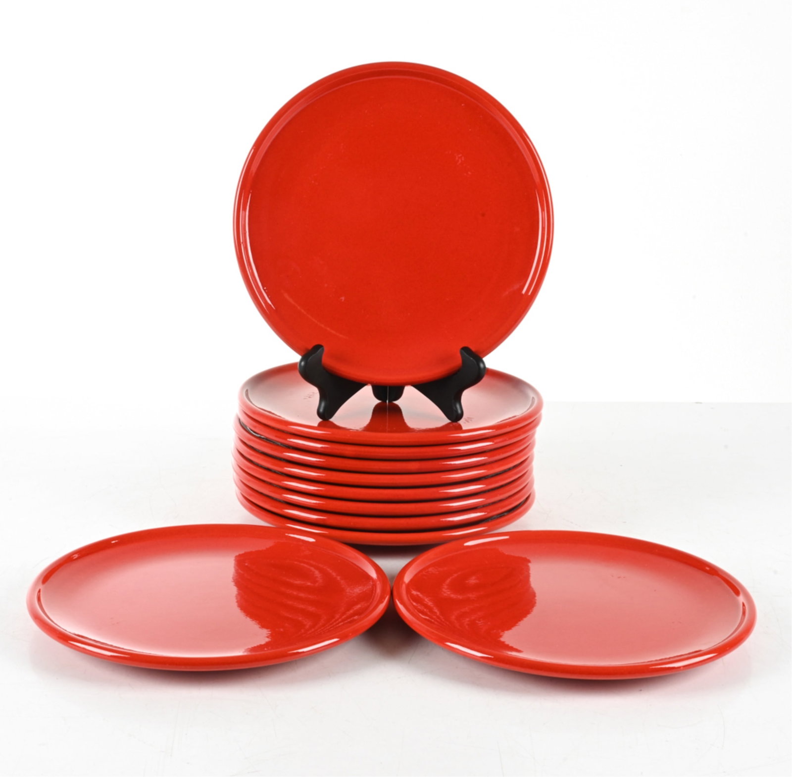 (11) CERAMIC DINNER PLATES; WEST GERMAN STYLE: Apparently unsigned. Dimensions: Dia. 10.5" Condition: In very good- to excellent used condition. A few faint knife marks.