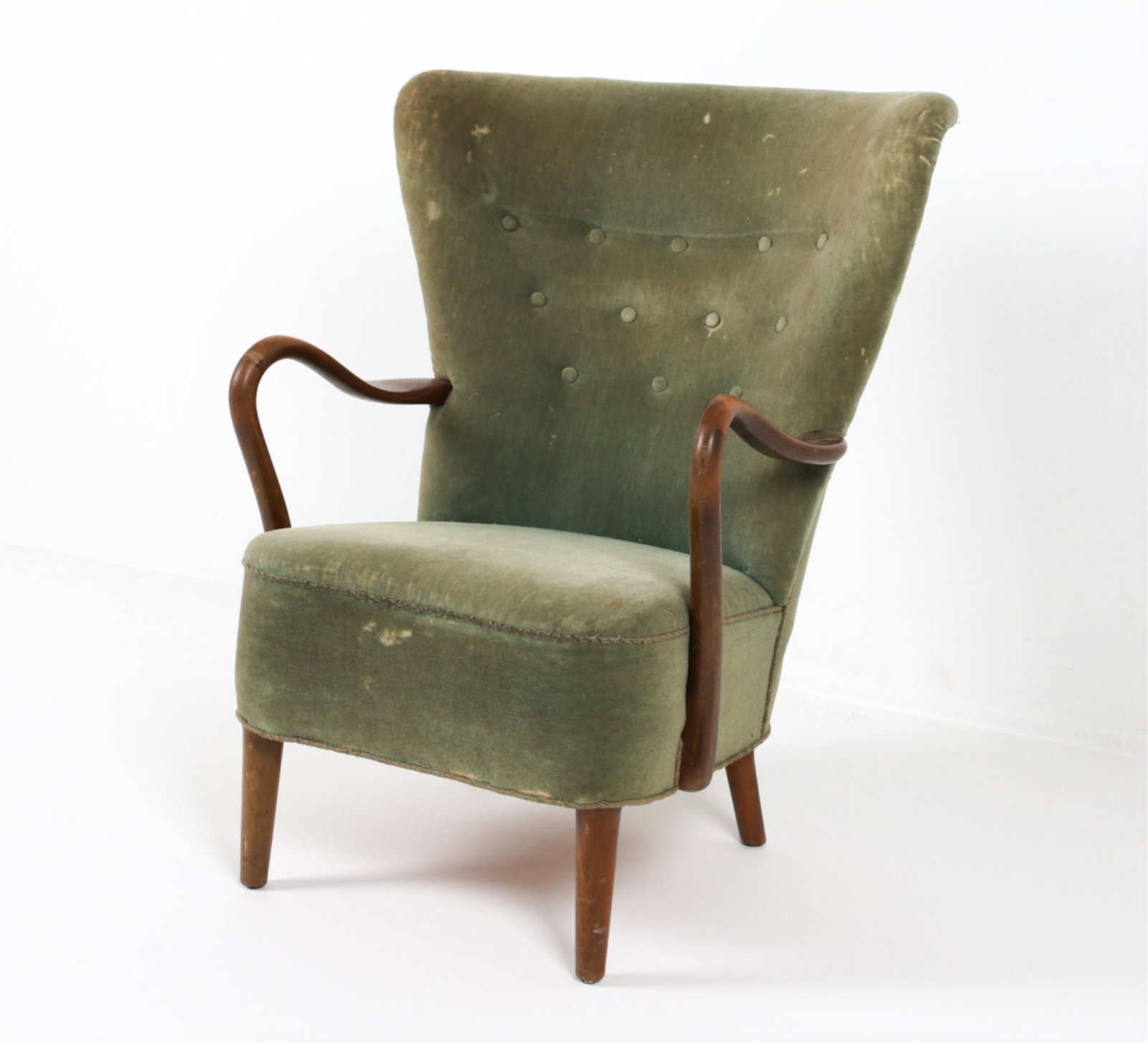 DANISH MOHAIR ARMCHAIR ATTR. ALFRED CHRISTENSEN: With iconic curved teak arms. Tapered legs. Buttons accenting on back. Danish, Circa 1960's. Dimensions: H 37.75" x W 25.5" x D 22.25" x SH 16.25". Condition: Mohair worn through in places on arms, se