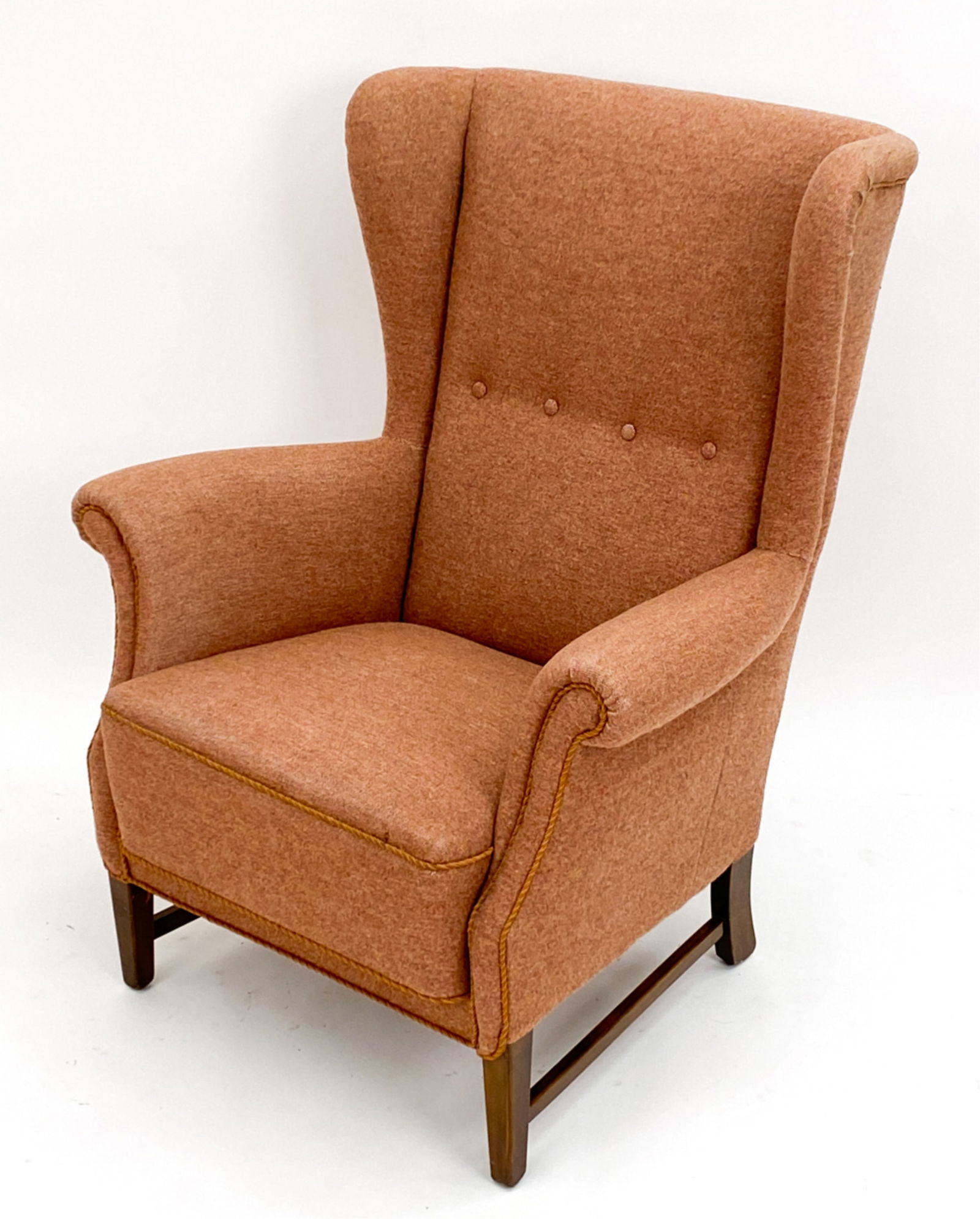 DUTCH HIGH BACK LOUNGE CHAIR. C.1950'S: Dutch fabric upholstery high back lounge chair. 1950 Fabric appears recently upholstered. Dimensions: H 40' x W 32" x D 25" Seat height 17" Condition: Wear includes rubbing to wooden legs and stretche