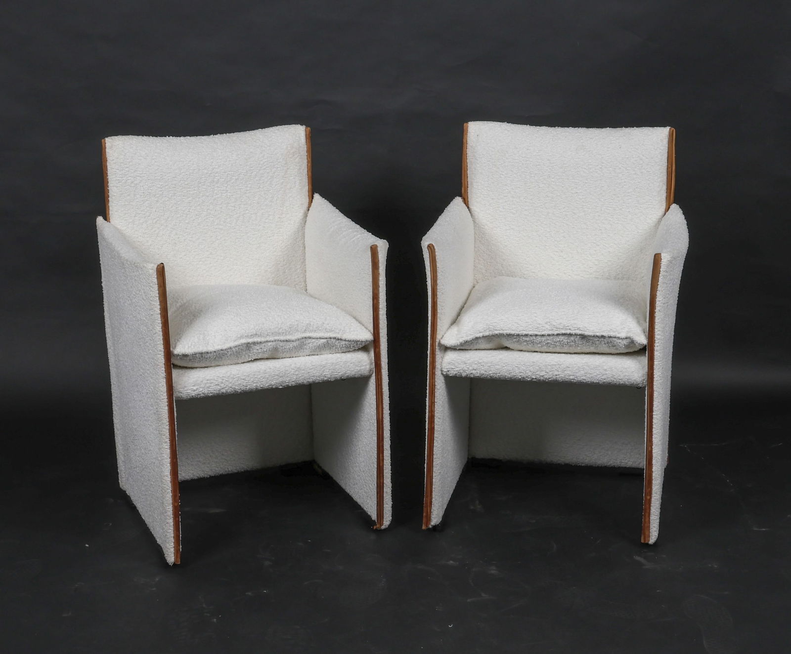 (2) 'BREAK 401' BOUCLE ARMCHAIRS BY MARIO BELLINI: For Cassina. Boucle upholstery, leather trim. Italy, circa 1970's. Dimensions: H 33" x W 19.5" x D 19" x SH 19". Condition: Wear to leather trim, some fraying. New upholstery. KONC001
