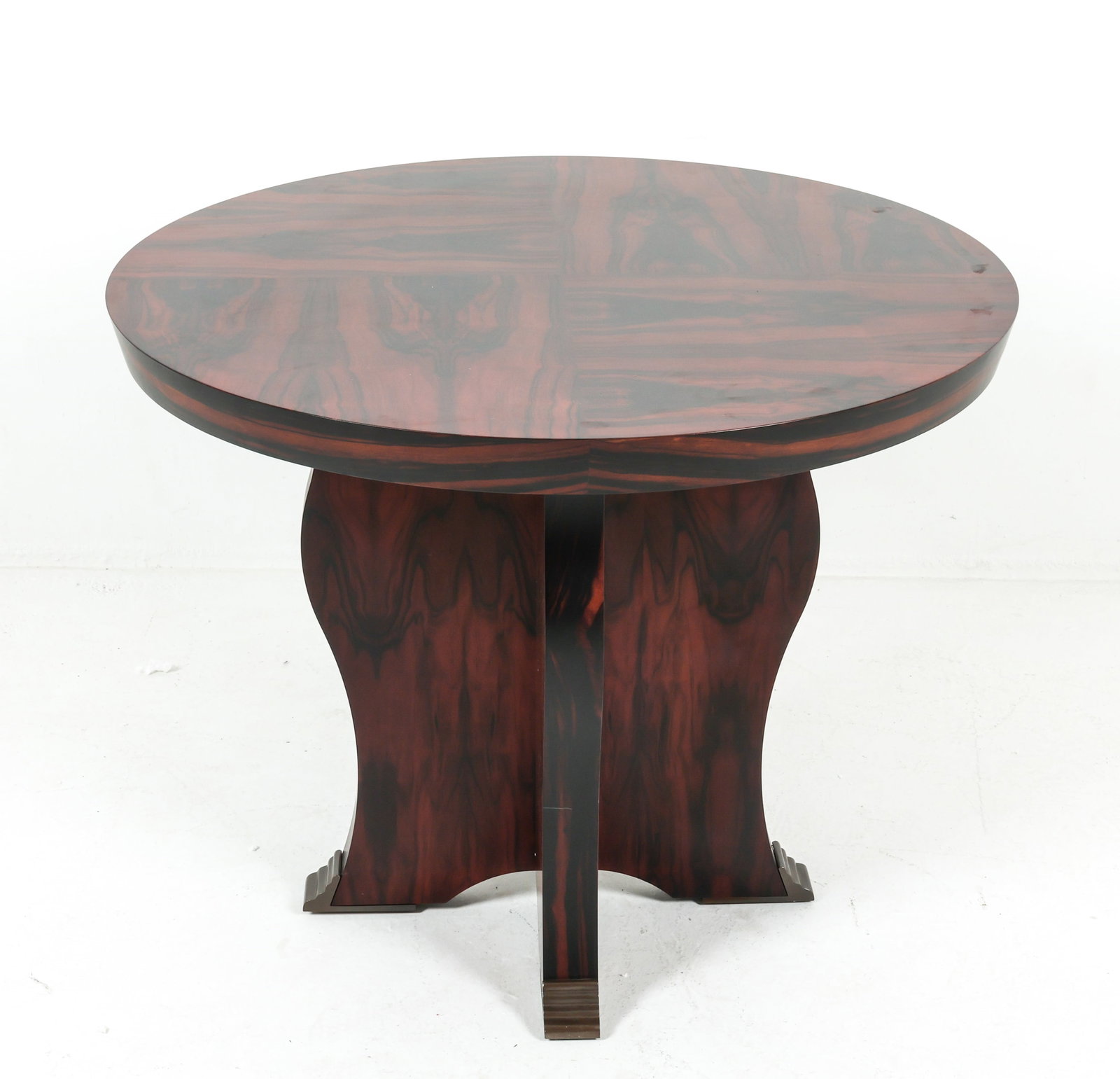 ROSEWOOD VENEER SIDE TABLE: Veneered surface with brass capped feet. Contemporary. Dimensions: H 29.75" x Dia. 37". Condition: Minor scuffs and rubs, good presentation overall.
