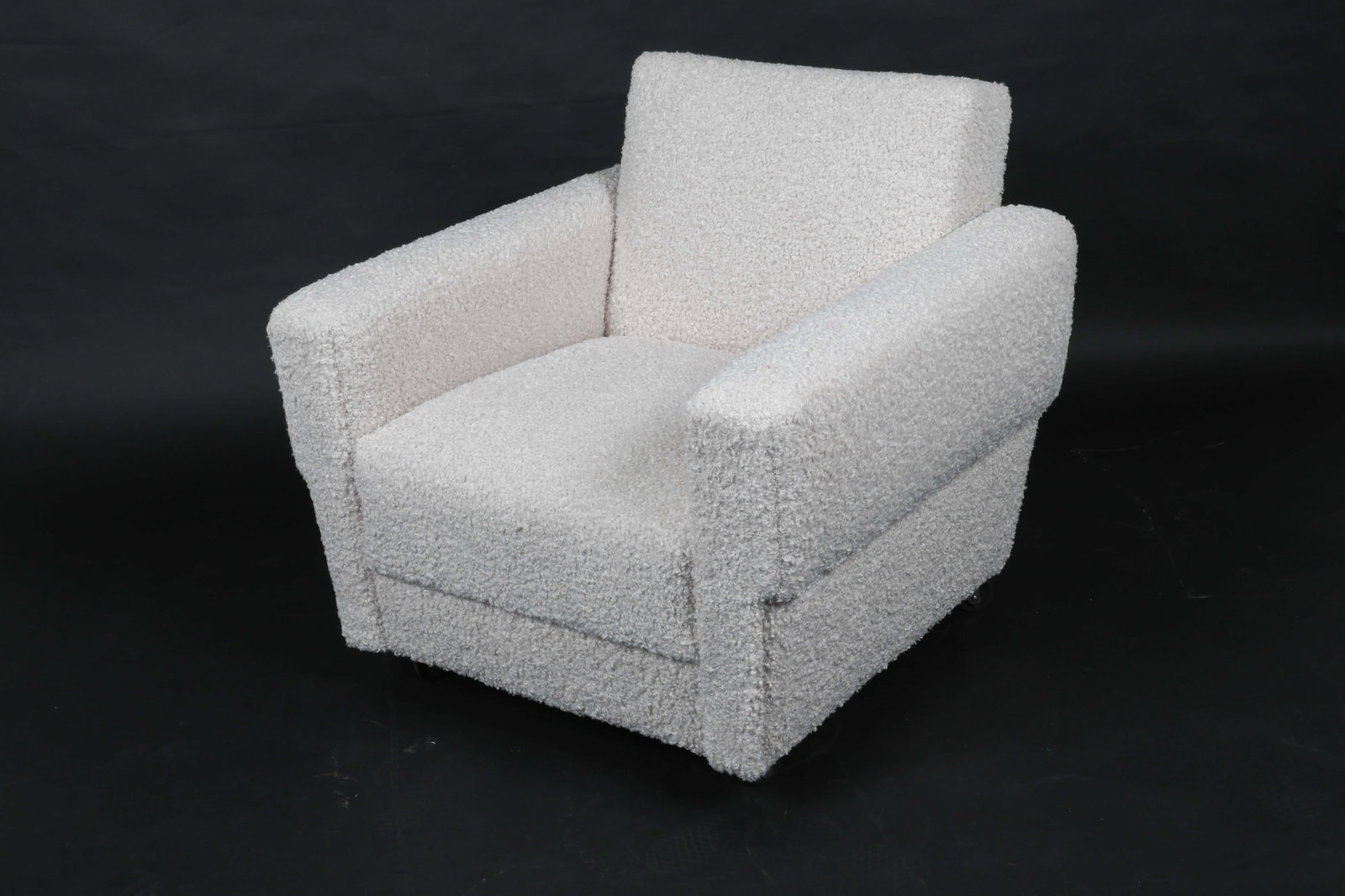 ITALIAN WHITE BOUCLE CLUB CHIAR: On casters. Mid 20th century. Dimensions: H 30.25" x W 33.5" x D 30" x SH 16.25". condition: Newly reupholstered, good presentation overall. KONC063