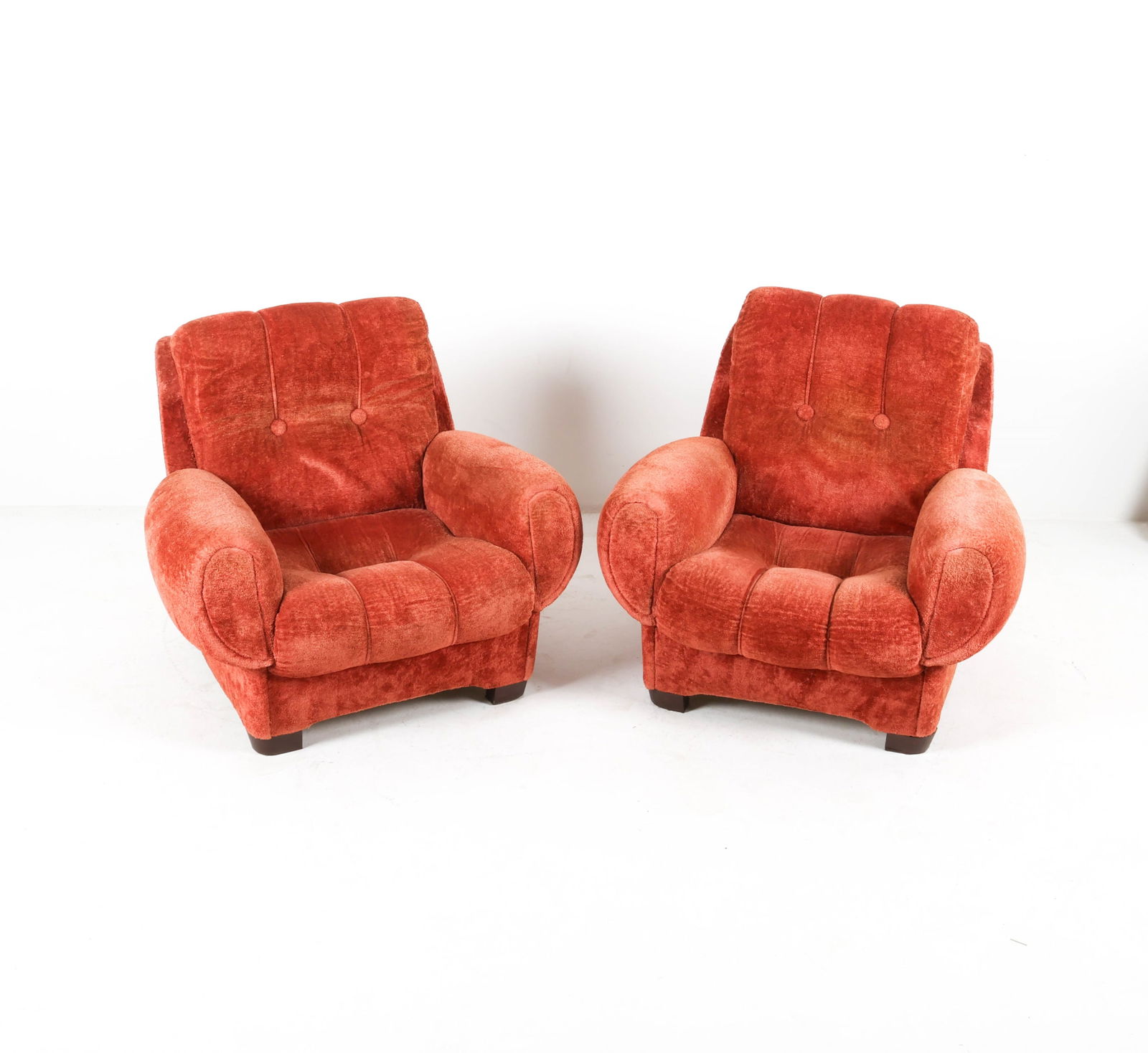 (2) MID-CENTURY ITALIAN CUT-FABRIC ARMCHAIRS: Tufted overstuffed fabric armchairs. Rust-red color. Mid to late 20th century. Dimensions: H 34.5" x W 35" x D 34" x SH 15". Condition: Fabric worn and stiff in places, some areas of surface soiling,