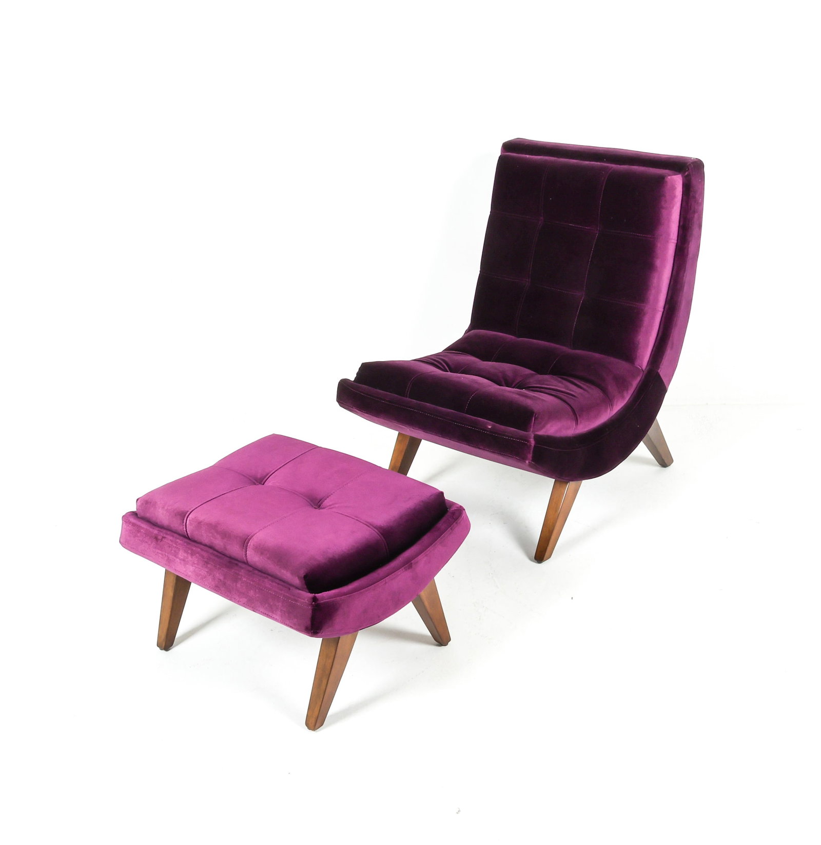PURPLE VELVET LOUNGE CHAIR AND OTTOMAN: Carved tapered birch legs. Contemporary. Dimensions: Chair H 37" x W 26.5" x D 30" x SH 17.25". Ottoman H 16.25" x W 24.75" x D 20". Condition: Minor spots of soiling on ottoman, good presentation ove
