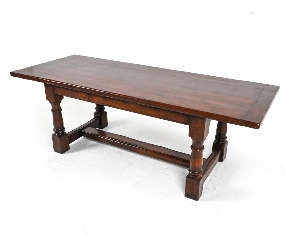 SCANDINAVIAN OAK REFECTORY TABLE: Carved and turned legs. Dark espresso stain. Early to mid 20th century. Dimensions: L 87 " x H 30" x W 33 ". Condition: Some spots of wear to finish on edges. Scuffs, scratches, dings. Scuffed materia