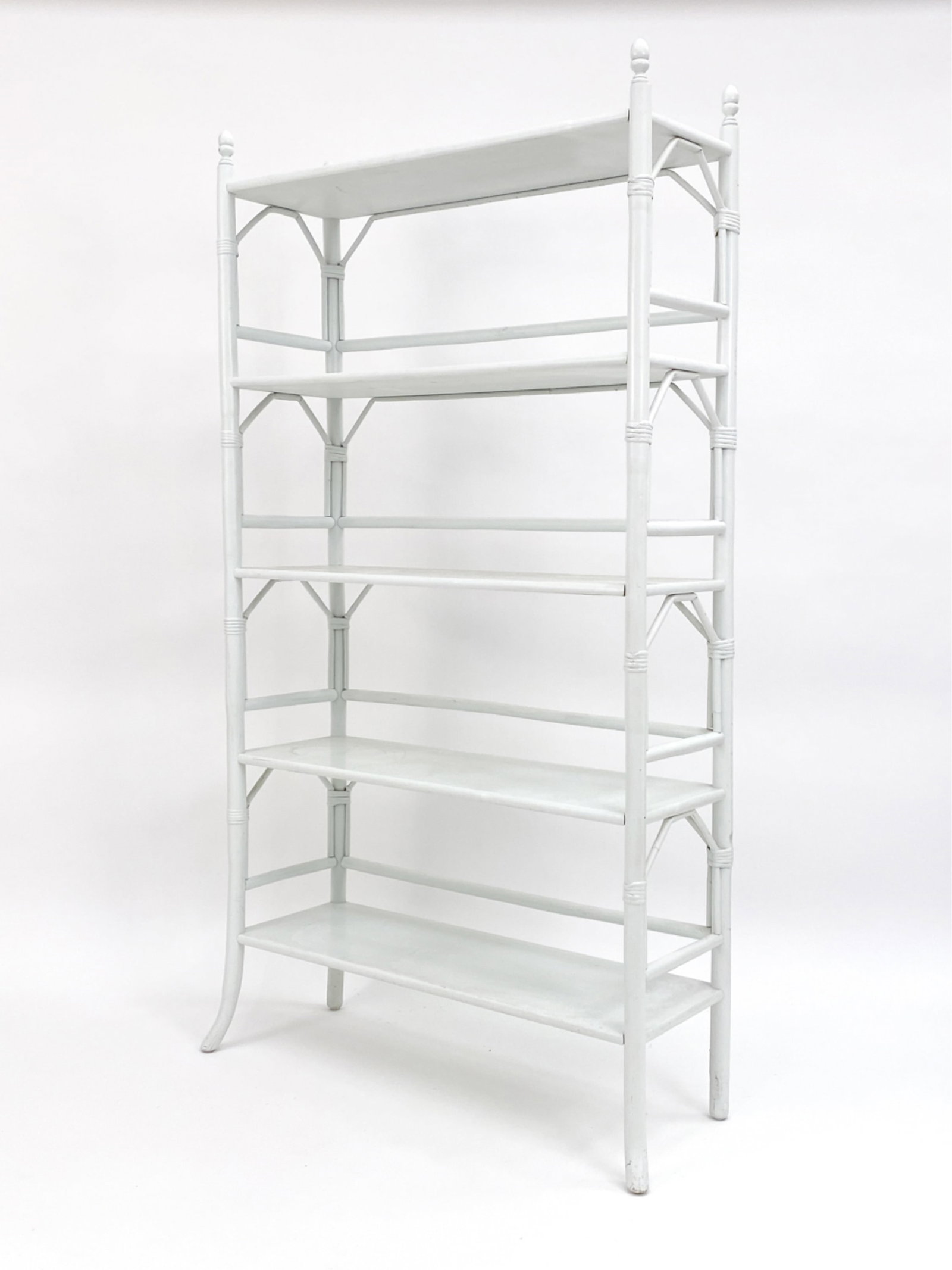 PAINTED BAMBOO ETAGERE: White painted bamboo Etagere with 5 shelves including top panel. Dimensions: H 69" x W 39" x D 13" Condition: Wear includes, dings and marks to bamboo. Consistent with age and use.