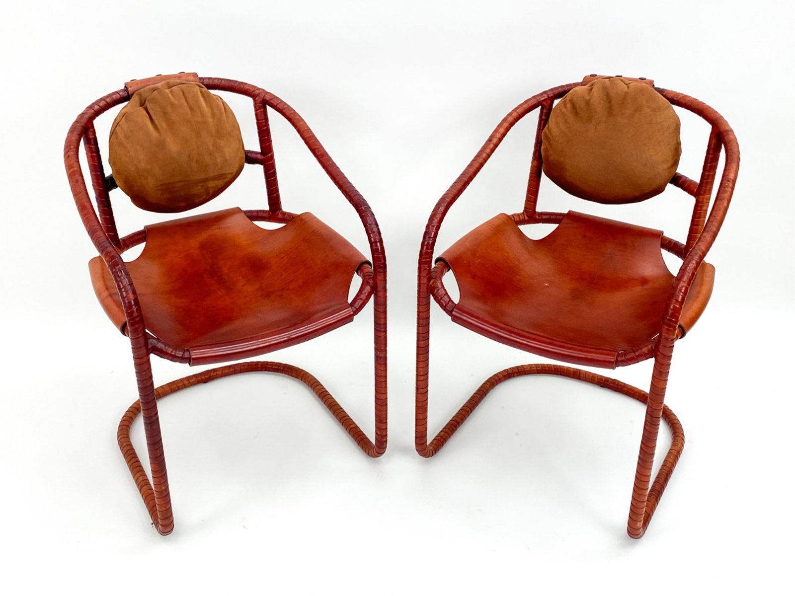 PAIR OF LEATHER WRAPPED CANTILEVER CHAIRS (1 of 13)