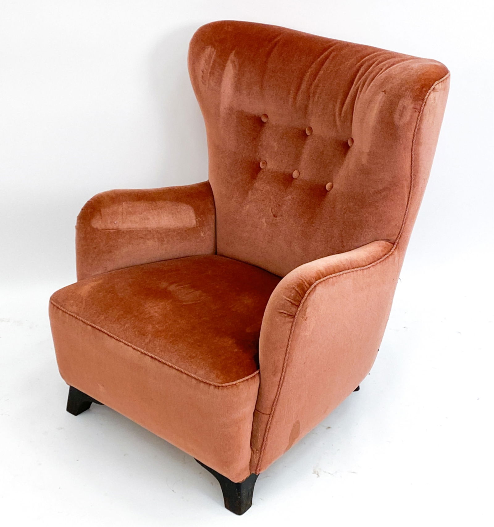 LASSEN STYLE DANISH OAK WINGBACK CHAIR, C. 1940: Danish mid-century wingback chair in red mohair with oak legs. Dimensions: H 36" x W 30" x D 37" x SH 15.5" Condition: Loss of paint to legs. Wear consistent with age and use. Couple small scattered s