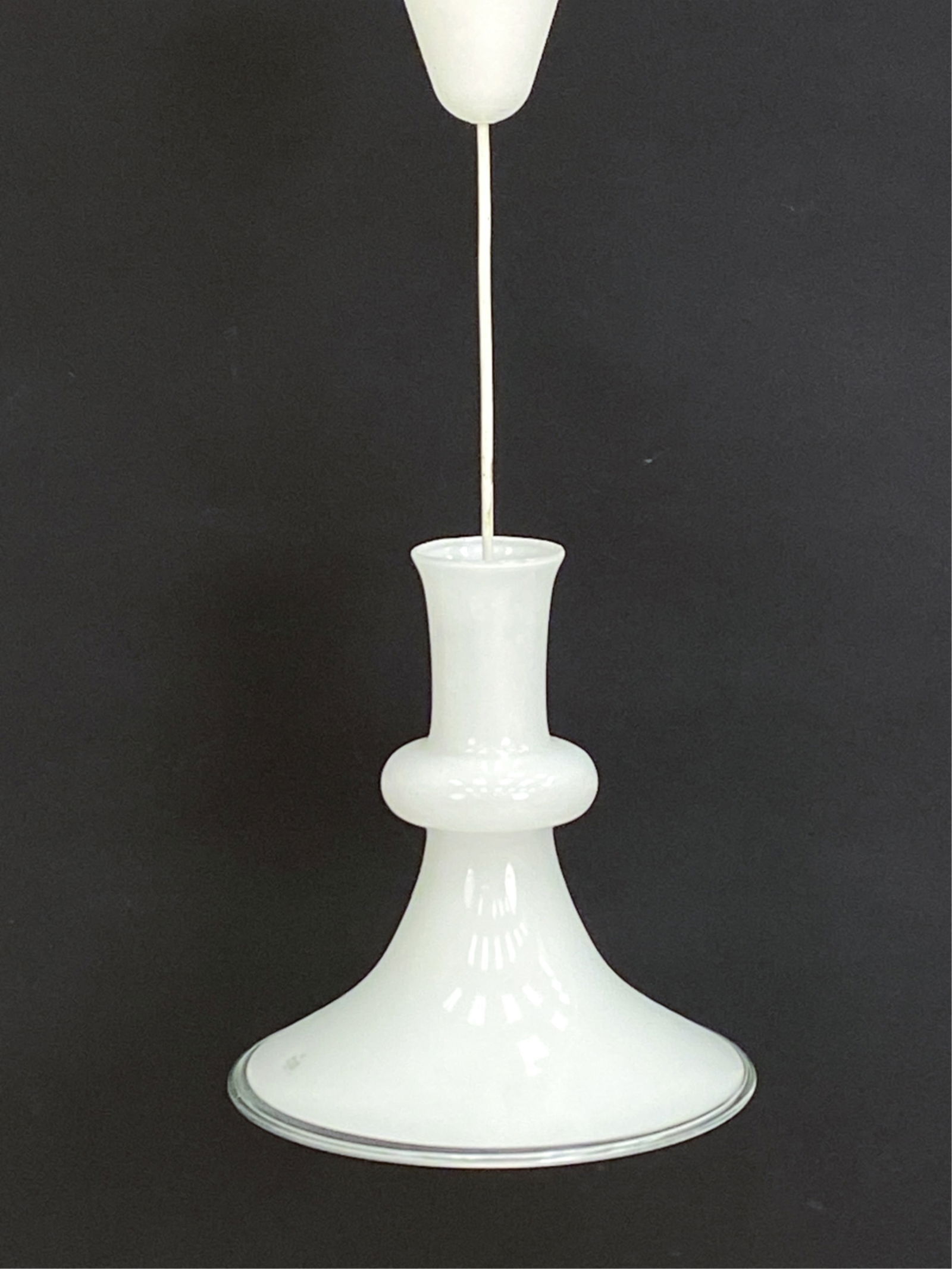 DANISH HOLMEGAARD GLASS PENDANT LIGHT: 'Etude' glass pendant lamp by Michael Bang. Manufactured by Holmegaard 1980-89. Made in Denmark. Two Holmegaard labels, one to front and one on top. Dimensions: H 12" x Dia. 11" Condition: Minor surfa