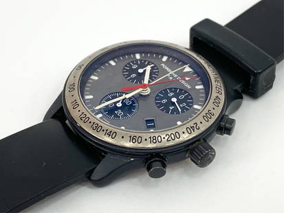 PORSCHE DESIGN PAT CHRONOGRAPH WATCH: 40mm aluminum-titanium case. Swiss made. Reference number 6610.14. With instruction manual. Dimensions: L 7" Condition: Band broken, in need of replacement. Untested.