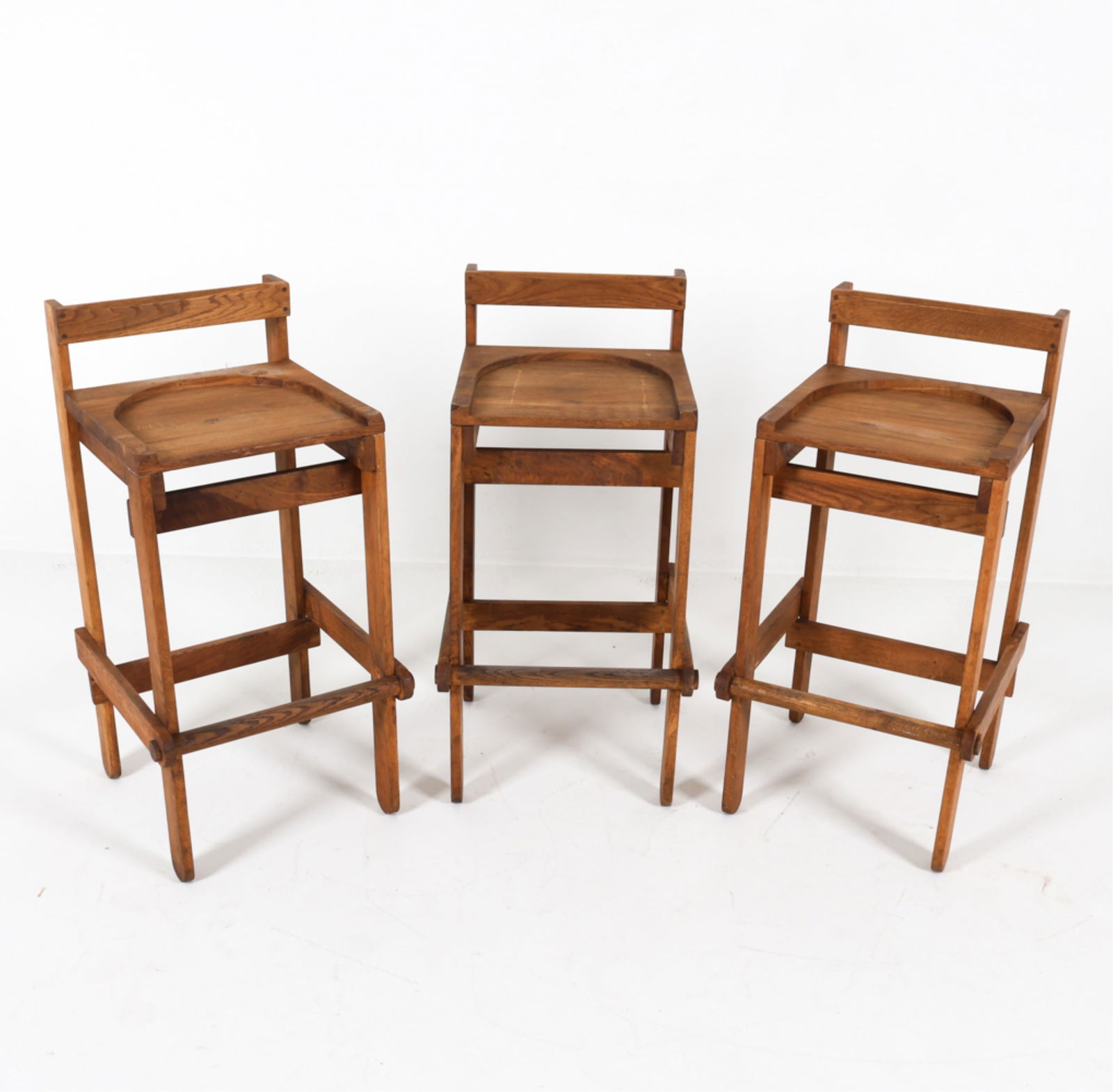 MANNER OF PIERRE CHAPO ELM BAR STOOLS, C.1970'S: Scandinavian. Dimensions: H 35" x W 15.75" x D 17.75" x SH 29.75". Condition: Some streaks of discoloration on seats, minor surface soiling. Scattered scuffs and dings. PI059