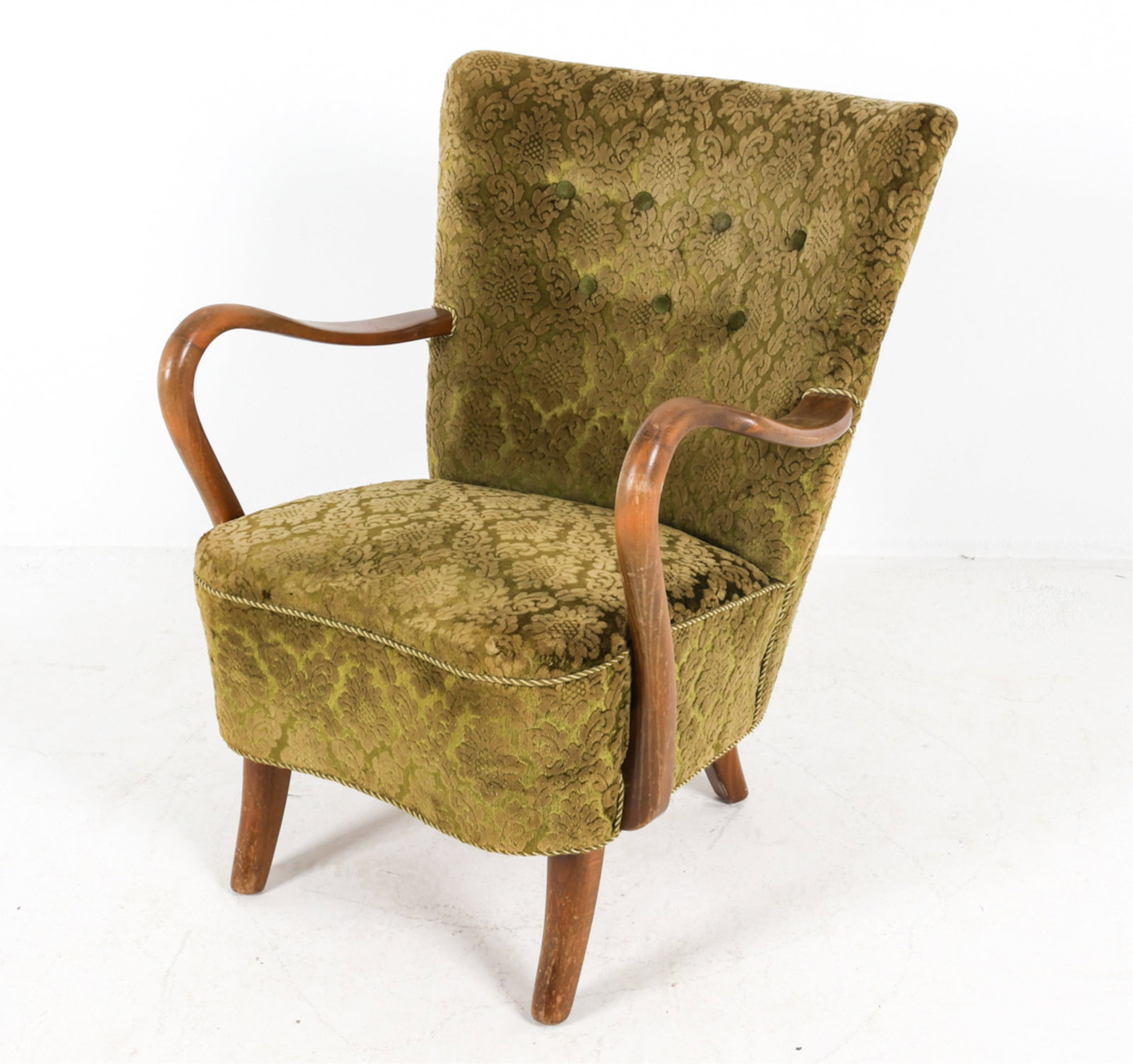 MANNER OF ALFRED CHRISTENSEN VELVET ARMCHAIR: Sculptural arms, tapered legs. Damask cut-velvet design on green upholstery. Denmark, circa 1960's. Dimensions: H 33.25" x W 26.25" x D 22.5" x SH 17.5". Condition: Minor signs of wear consistent with