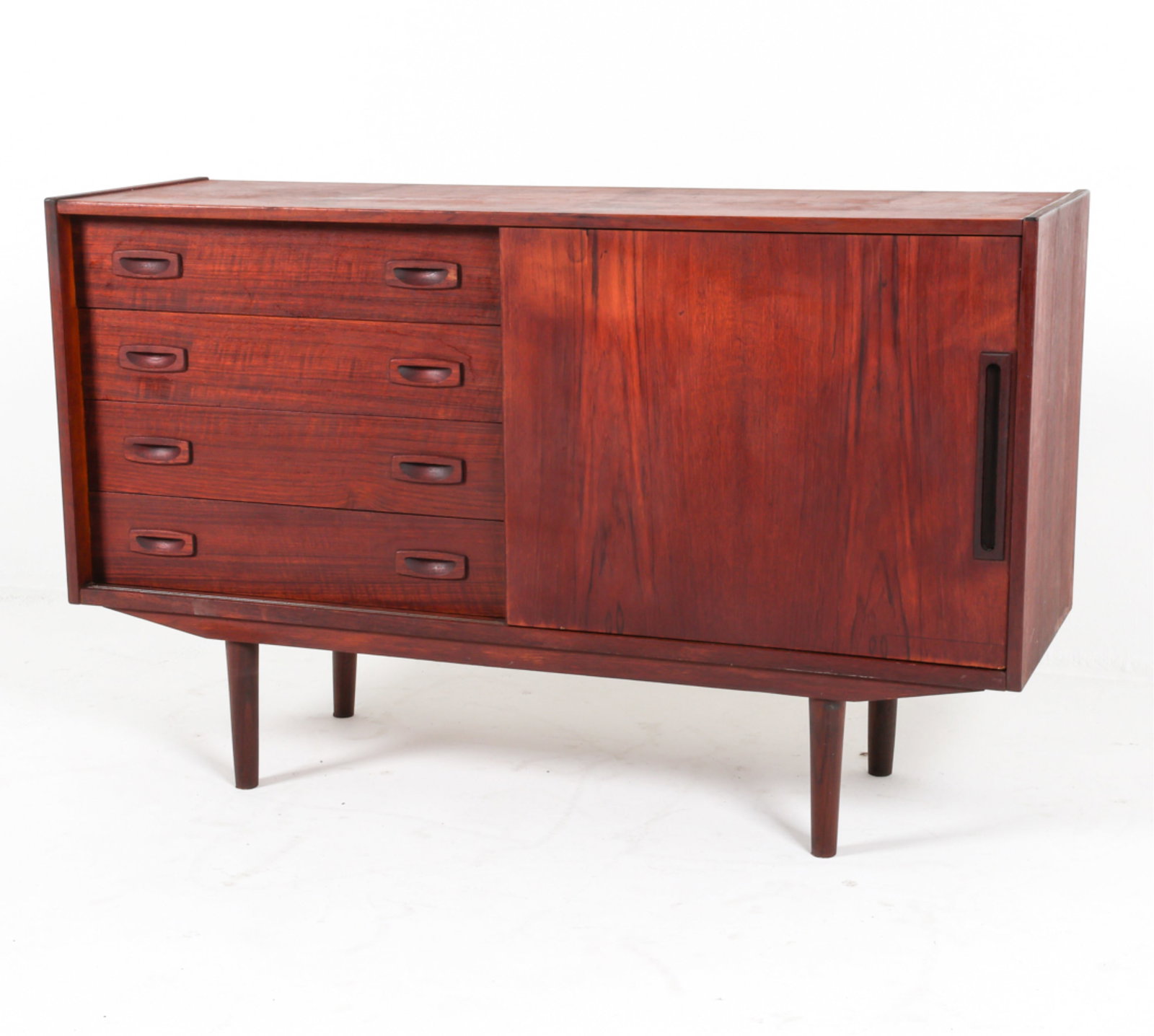 DANISH MID-CENTURY TEAK SIDEBOARD, C.1960'S: Four drawers and sliding cabinet with interior adjustable shelves. Sculpted inset drawer and cabinet door pulls. Dimensions: H 29.75" x W 48" x D 15.5" Condition: Wear consistent with age and use, int