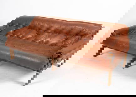 MANNER OF PERCIVAL BRAZILLIAN LEATHER SOFA: Beech or elm frame. Tufted leather upholstery. Apparently unsigned, the design is similar to that of Percival Lafer's MP-41 series. Mid 20th century. Dimensions: H 30" x W 76.5" x D 37.5" x SH 16". Co