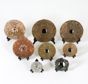 GROUPING OF CHINESE CARVED HARDSTONE BI-RINGS