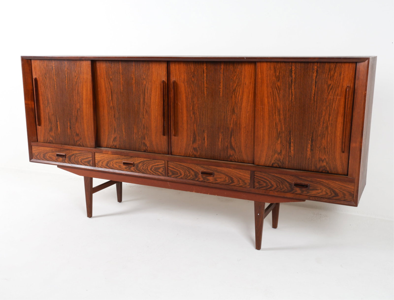 DANISH ROSEWOOD SIDEBOARD, C.1960'S: Adjustable shelves. Sits on base. Dimensions: H 43.25" x W 86.75" x D 17.25". Condition: Some chips on top edges. screws for base not included. Several water rings on inner shelves. Some water spots n