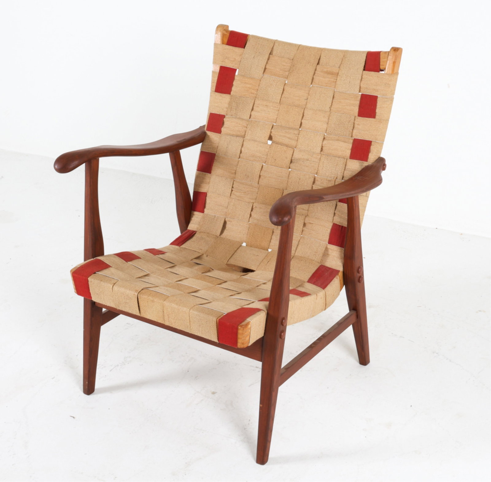 DANISH TEAK AND CANVAS SLING CHAIR: Denmark, Circa 1950's. Dimensions: H 31.25" x W 25.25" x D 29.5" Conditions: Wear consistent with age and use. Some surface soiling to canvas sling. Scattering of scuffs and scratches. PER A59