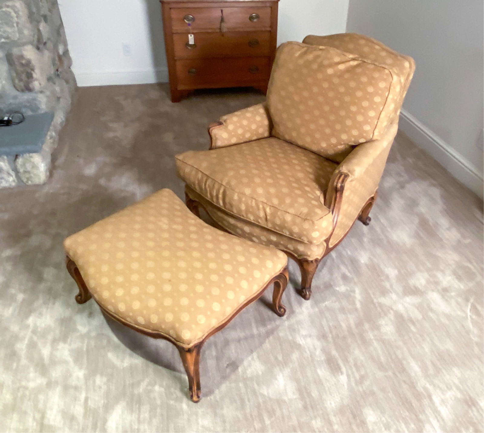 FRENCH STYLE BERGERE LOUNGE CHAIR & OTTOMAN: 20th C. With down filled upholstery. Dimensions: (Chair) H 35" x W 32" x D 36" Seat height 21" (ottoman) H 14" x W 28" Condition: some wear and staining to fabric. mostly to ottoman Some wear, nicks a