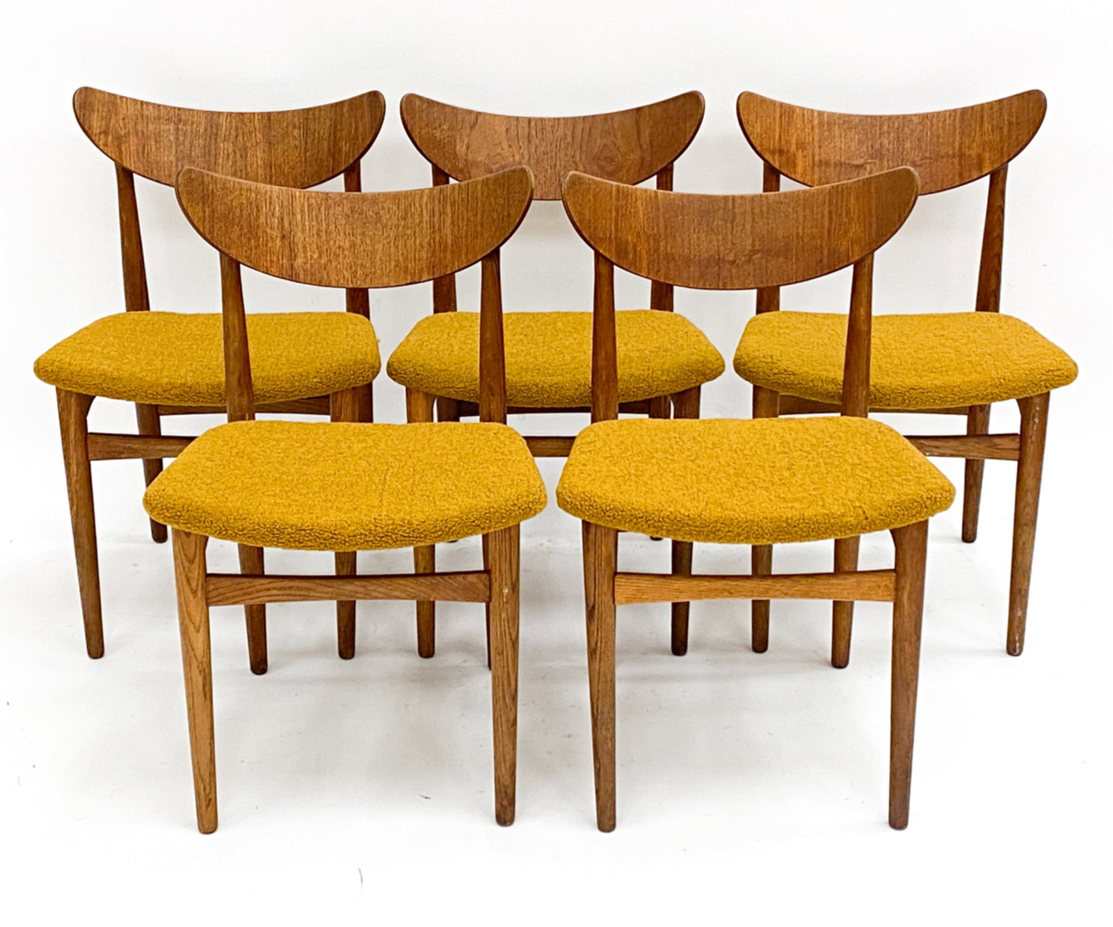 (5) DANISH TEAK DINING CHAIRS: Dimensions: H 30.5"x W 19" x D 17" Seat height: 18" Condition: Wear consistent with age and use. Minor scuffs and blemishes to backs and legs. F058