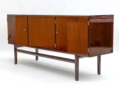 OLE WANSCHER DANISH MAHOGANY SIDEBOARD: Label to backside. Includes 3 keys. Dimensions: H 32.5 x W 71" x D 18.75" Condition: Wear consistent with age and use. Repair to corner of central door. F098