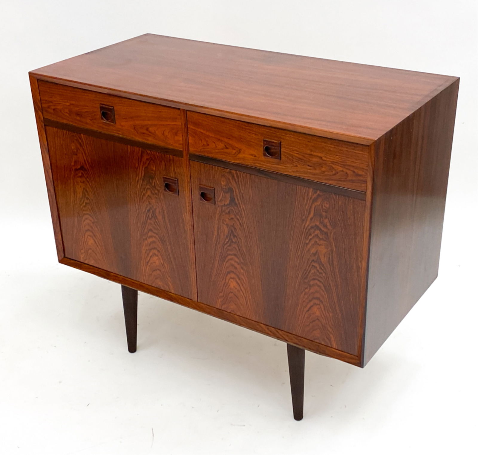 DANISH ROSEWOOD CREDENZA BY BROUER: Adjustable interior shelves with brass fittings. Dimensions: H 34.5" x W 39.5" x D 19.75" Condition: Watermarks and scratches to top. Wear consistent with age and use F114
