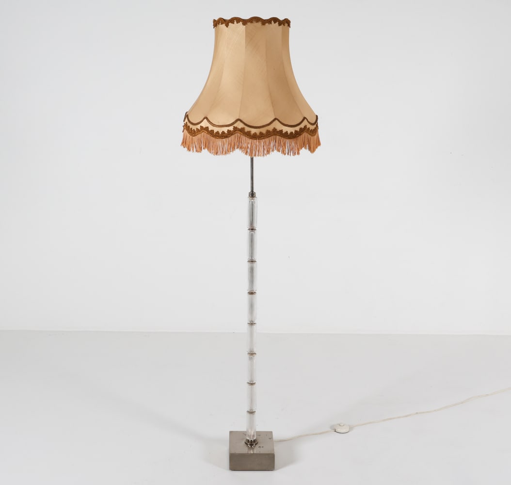 SCANDINAVIAN CHROME AND GLASS FLOOR LAMP: With fabric shade no harp or hardware to mount shade, Shade is currently resting on finial. Ribbed glass cylindrical segments stacked on chrome stand. Dimensions: w/ shade H 69" x Dia. 20". Condition: