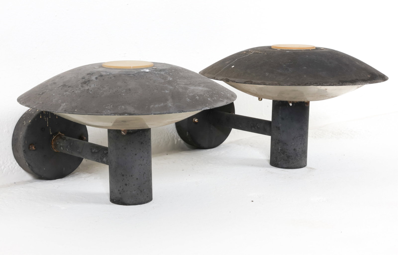 PAIR CONTEMPORARY DANISH OUTDOOR SAUCER SCONCES: Iron and plastic. Dimensions: H 7.5" x W 11.75" x D 15". Condition: Scuffs, scratches, surface soiling. Wear consistent with outdoor use. DMJ046