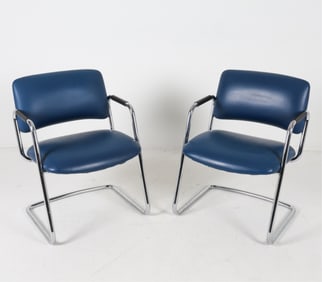 PAIR OF STEELCASE CHROME AND VINYL ARM CHAIRS