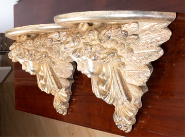 PAIR OF CAST CHERUB WALL BRACKETS