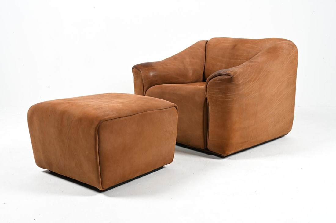 DE SEDE DS-47 LEATHER LOUNGE CHAIR & OTTOMAN: Introducing a rare and exceptional find from the iconic 1970's: a De Sede DS-47 lounge chair with matching ottoman in sumptuous nubuck leather. This chair represents the pinnacle of Swiss craftsmanshi