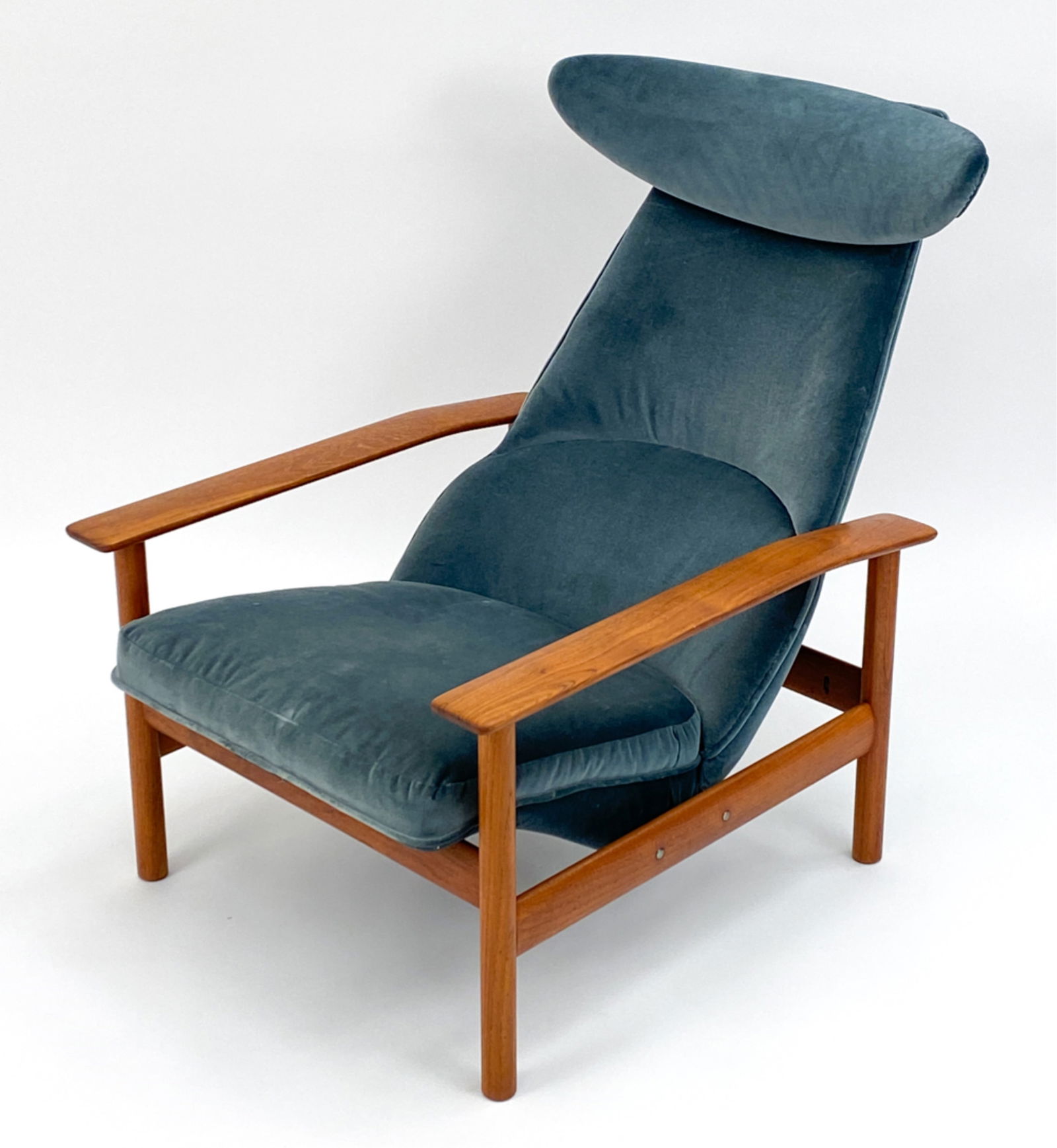 SVEN IVAR FOR DOKKA MOBLER RECLINING CHAIR: Teak frame and horn shaped backrest. Dimensions: H 35" x W 28" x D 44" Seat height 15" Condition: Indents to upholstery. wear consistent with age and use.