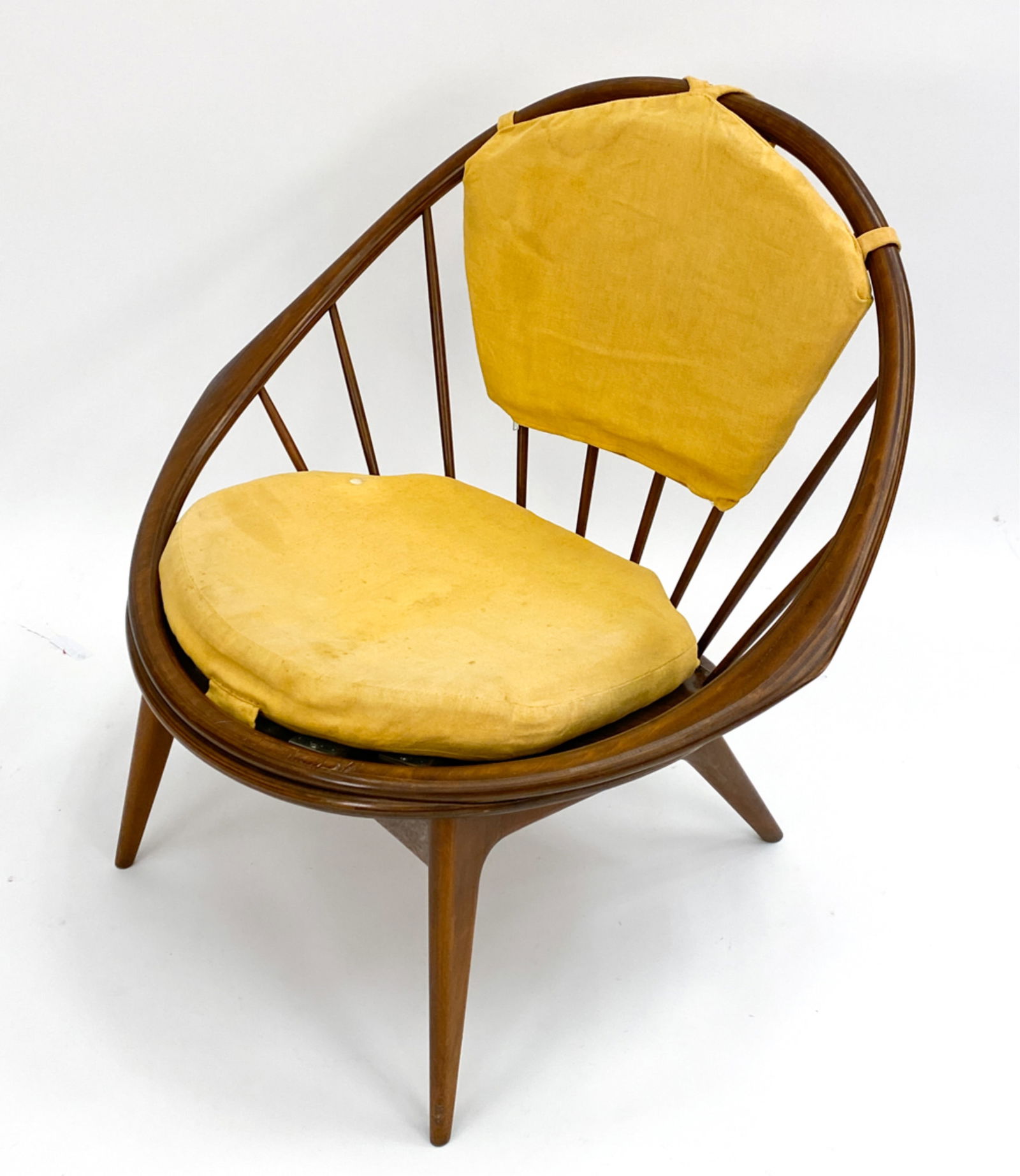 IB KOFOD-LARSEN FOR SELIG WALNUT 'PEACOCK' CHAIR: Danish Mid-Century 'Peacock' Hoop chair designed by Ib Kofod-Larsen. Manufactured by Selig circa 1950/60s. Upholstery, walnut. Dimensions: H 32.5" x W 33.75" x D 26" x SH 17" Condition: Minor surface