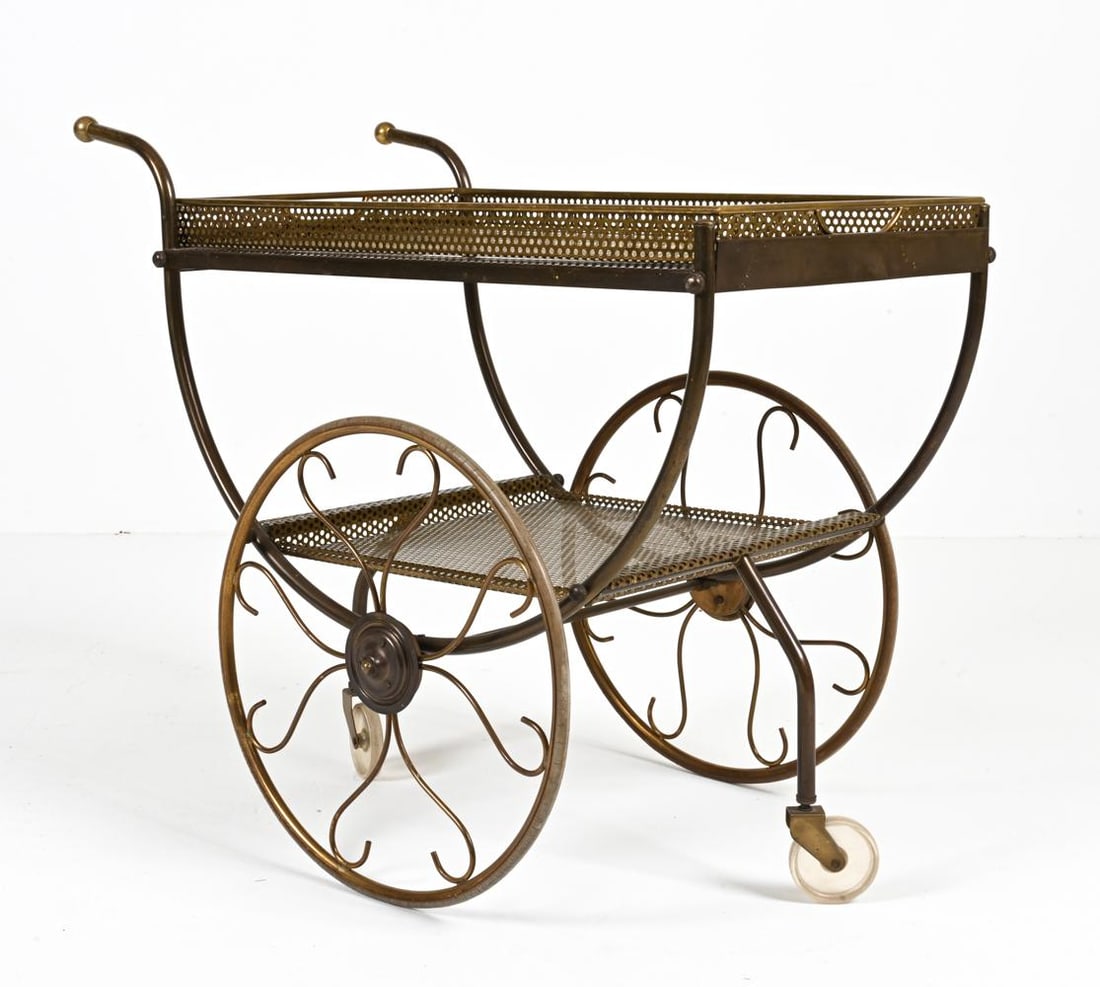 BRASS BAR CART BY JOSEF FRANK FOR SVENSKT TENN.: Channel Old Hollywood glamour with this fantastic and rare serving trolley designed by Josef Frank for Svenskt Tenn. Crafted from pierced brass with scrolled wirework decorating its dramatically overs