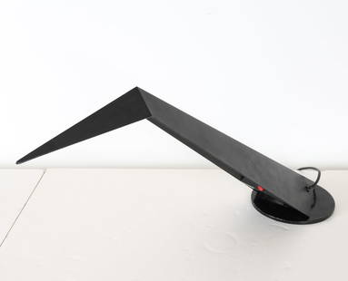 YVES CHRISTIN CONCORDE TABLE LAMP, C.1970'S: For Illuminazione. Black lacquered steel. Shape is evocative of an airplane's tail piece. Swivels on base. Italy, circa 1970's. Dimensions: H 16" x W 8" x D 28". Condition: Wiring untested. Some scuff