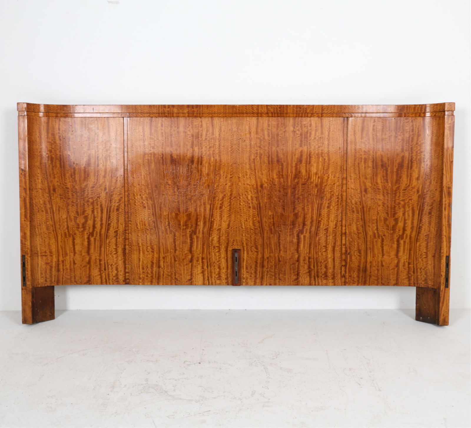 ART DECO FLAME BIRCH HEADBOARD: Flame birch veneer. Apparently unsigned. 20th c. Dimensions: H 43" x W 82" x D 5". Condition: Minor chips to veneer, some scuffs, scratches, dings. Wear consistent with age and use.