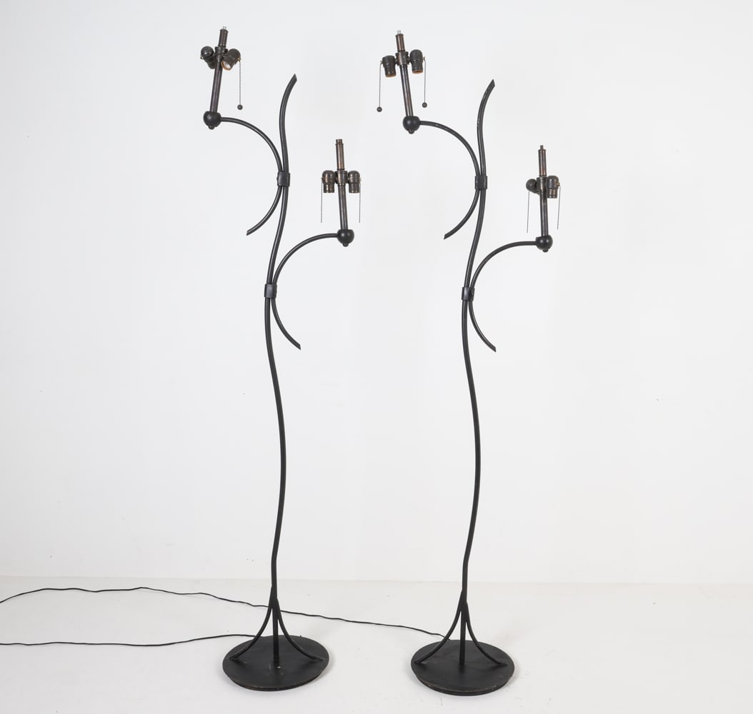 PAIR OF MID-CENTURY SCULPTURAL STEEL FLOOR LAMPS: Dimensions: H 77" x W 19" x D 13". Condition: Scattered scuffs, dings, rubs, surface soiling. Wiring untested. Missing finials. Wear consistent with age and use.
