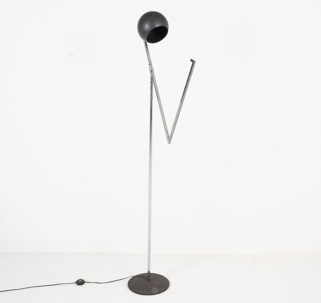 ROBERT SONNEMAN CANTILEVER FLOOR LAMP FOR REPAIR: Missing one lamp fixture and shade, For Kovacs. Textured black aluminum eye-ball shade. Adjustable arm. iron base. Circa 1980's. Dimensions: H 70" x W 17" x D 11.5". Condition: Missing one lamp, Wirin