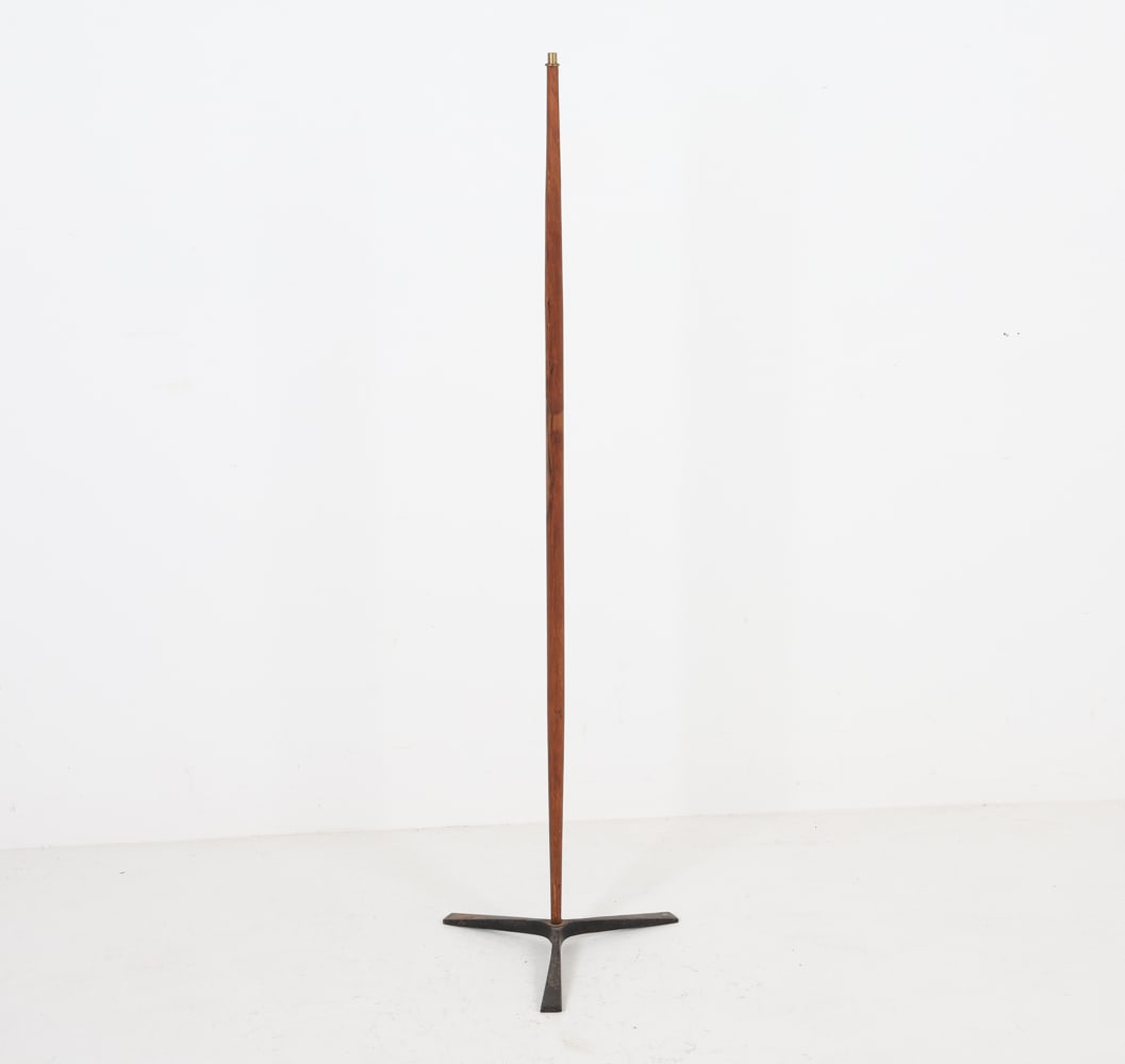 MID-CENTURY TEAK AND IRON FLOOR LAMP BASE: For repair. Dimensions: H 47.5" x Dia. 13". Condition: Needs wiring and socket. Some splits to wood. Corrosion and scuffs to iron base. Wear consistent with age and use.