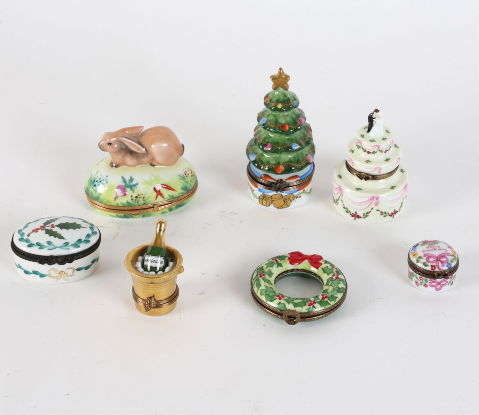 LIMOGES FRENCH PORCELAIN TRINKET BOXES: All marked and signed to interior and undersides in holiday themes. Dimensions: (Largest) H 4.25" x Dia 4" Condition: Frames and hinges may require repairs.