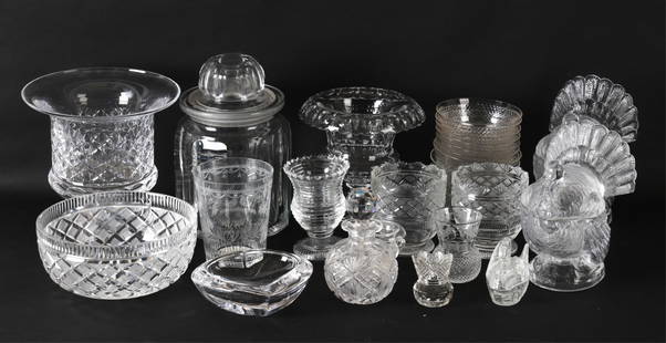 GLASS & CRYSTAL GROUPING, ORREFORS & YEOWARD: Grouping of 26. Marked William Yeoward vases and bowls. Heart form Orrefors bowl. Turkey form trinket boxes, etc Dimensions: (Largest) H 10" x Dia 6.5" Condition: Minor scuffs and scratches to glasses