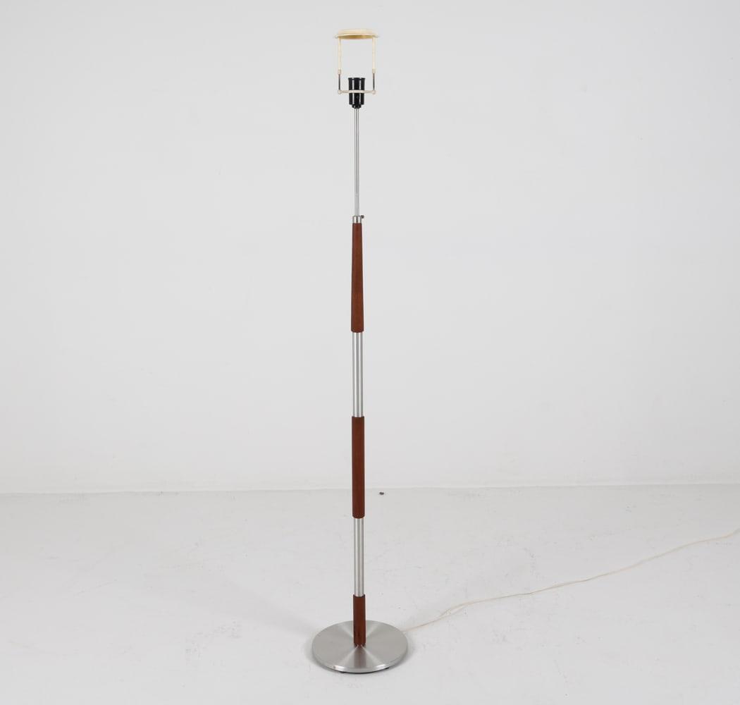 DANISH TEAK & ALUMINUM LAMP MANNER OF HAMMERBORG: In the style of Jo Hammerborg. teak and aluminum post with adjustable top. Dimensions: H (highest point) 60" x Dia 10" Condition: Marks and scuffs to wood, with minor nicks to wood on top section. Eur