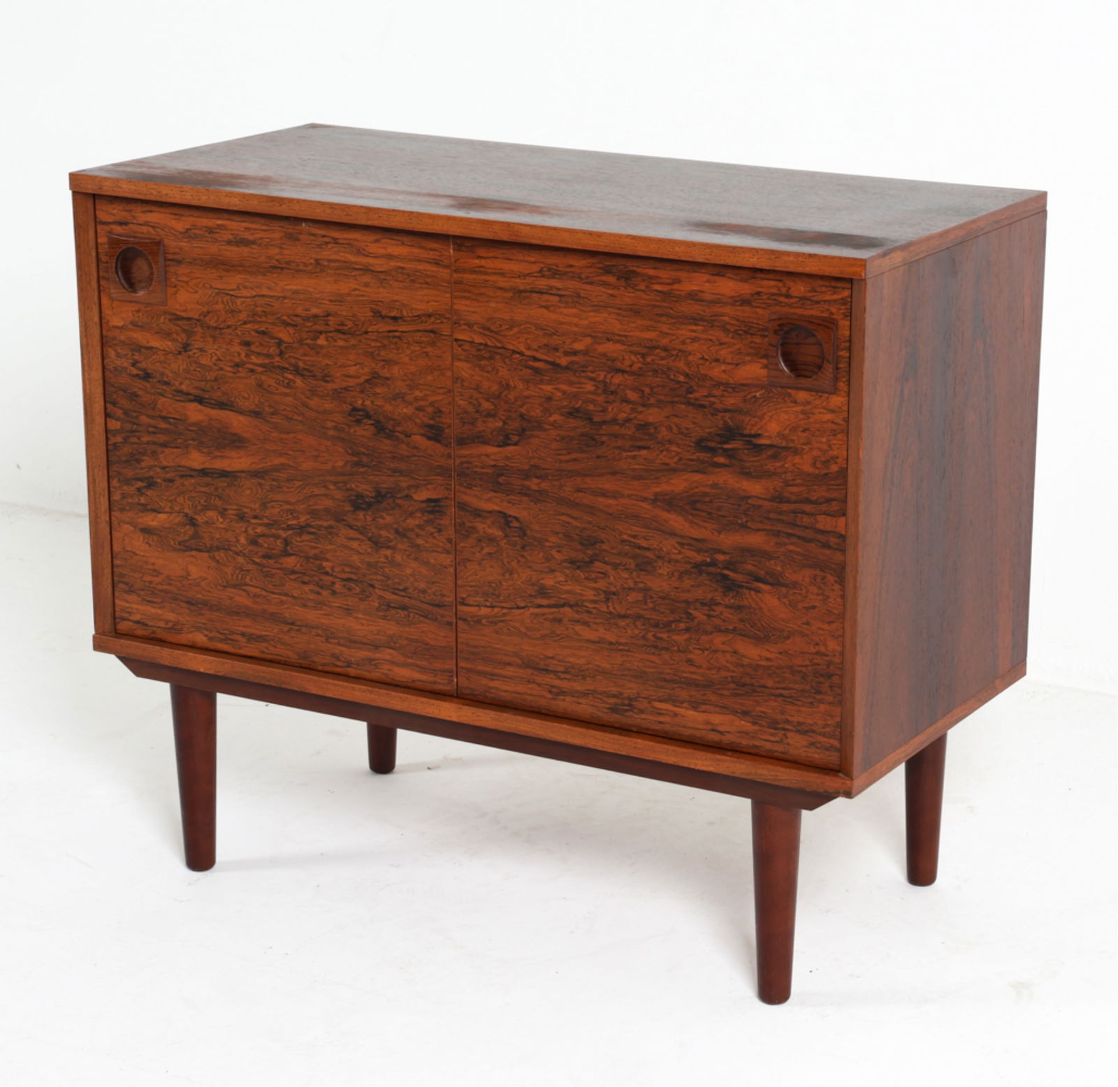 DANISH MID CENTURY ROSEWOOD CABINET C.1960'S: With adjustable shelves. Dimension: H 27" x W 32.25" x D 15.5" Condition: Marks and scratches to top. sun fading to top. DMK243