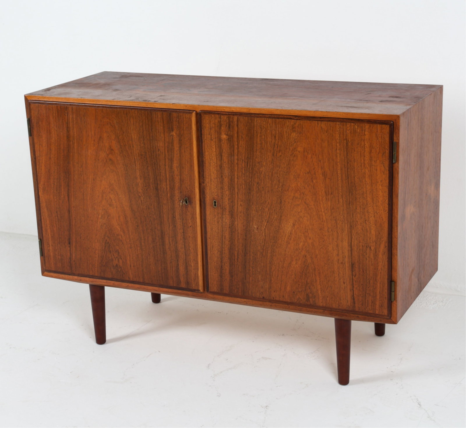 DANISH ROSEWOOD SIDEBOARD CABINET, C.1960'S: Key included. Adjustable shelves. Dimensions: H 29.5" x W 42.5" x D 17". Condition: Wear consistent with age and use. DMK166